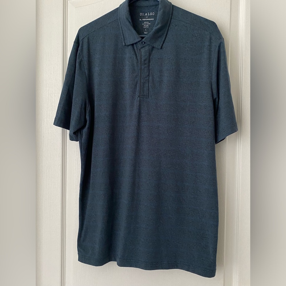 01. Algo. Size large. Blue polo shirt.